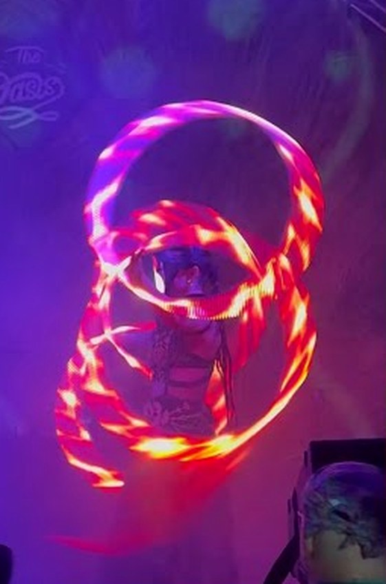 Digital Fire simulated-fire quad hoops burning orange and red on stage with Desert Dwellers