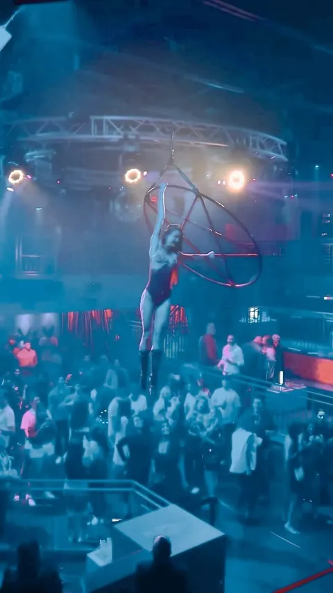 Aerial pentagram flown above a packed club floor in Austin