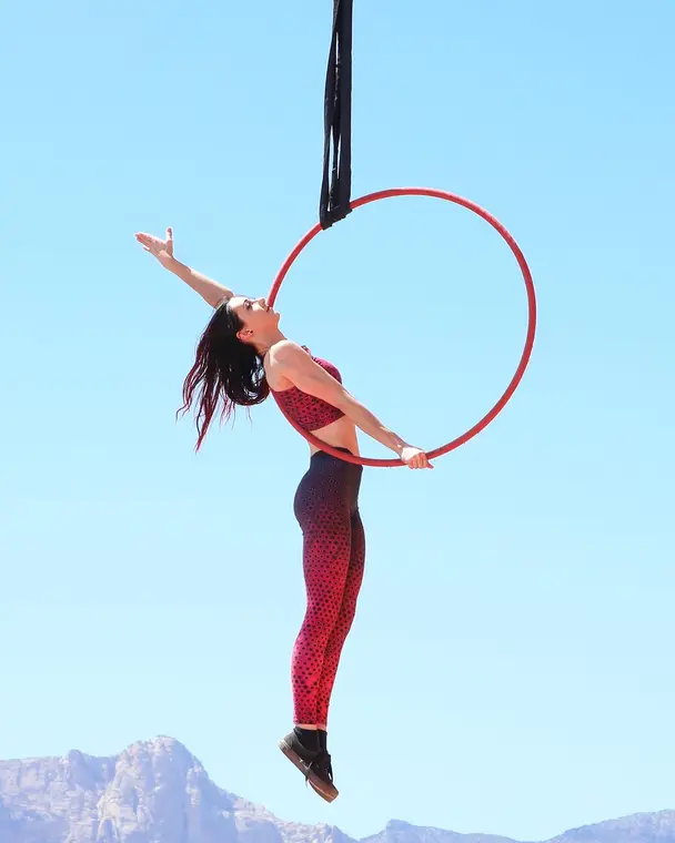 Aerial hoop rigged outdoors with mountains behind