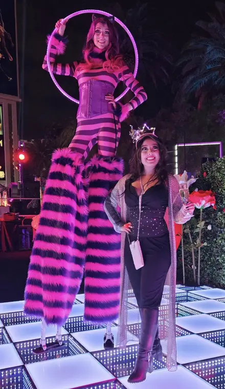 Cheshire Cat character on stilts