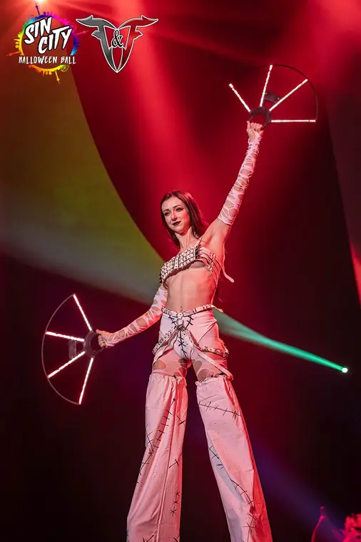 LED fans performed on stilts at the Fetish and Fantasy Ball