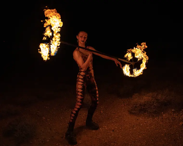 Fire dragon staff rolling across the body