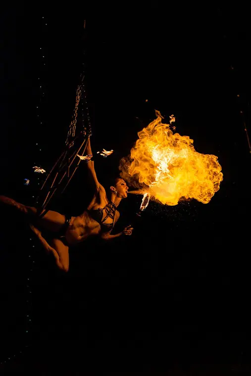 Fire breathing from inside the aerial pentagram at Southwest Flow Festival