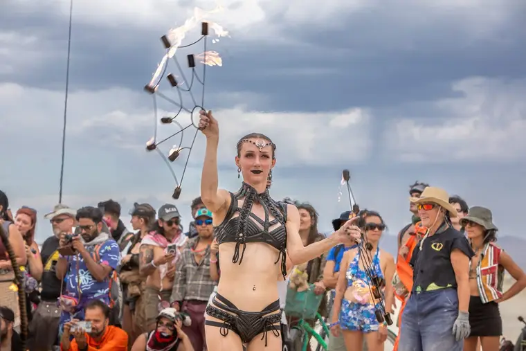Fire fans during a Burning Man opening ceremony