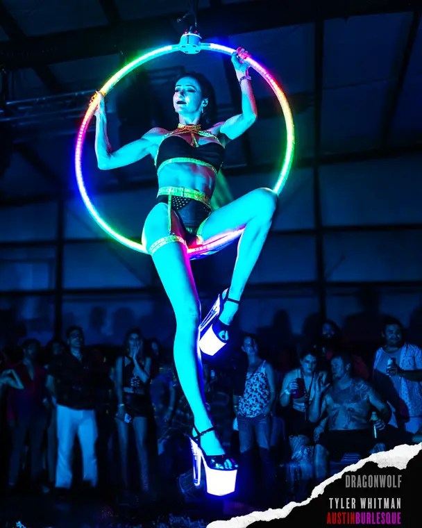 LED lyra performed in heels