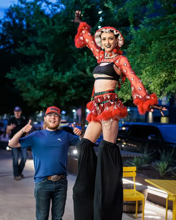 Two mushroom stilt walkers