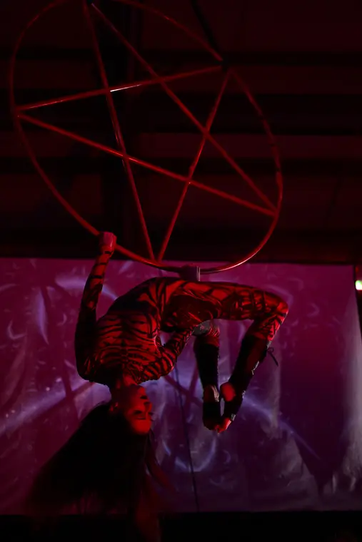 Hang from the aerial pentagram