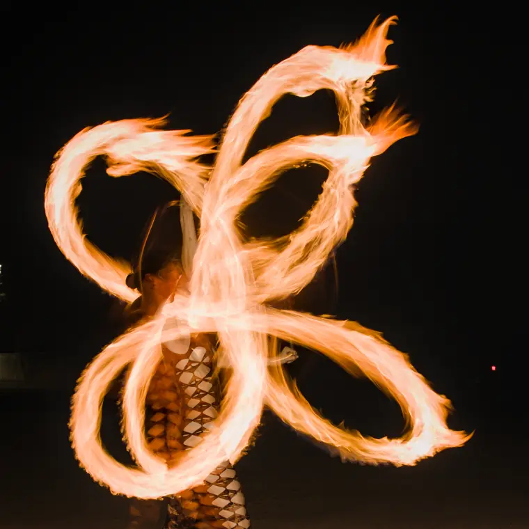 Fire poi flower pattern in long exposure
