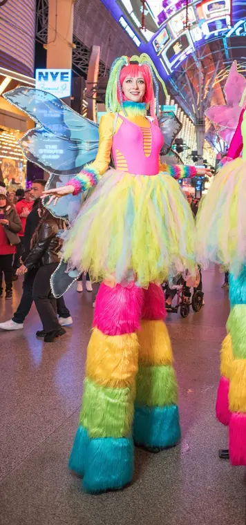 Rainbow stilt costume for New Year's Eve on Fremont Street