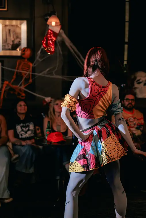Sally character with full body paint on stilts
