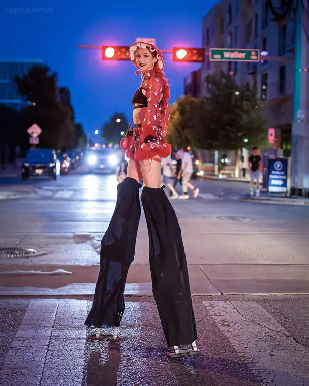 Mushroom stilt character on the street